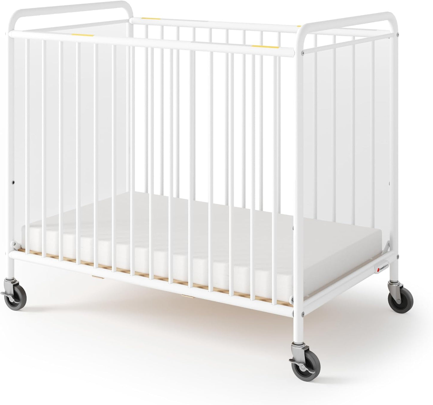 Foundations Chelsea Clearview Metal Compact Daycare Crib, 3" Casters, Compact Mini Size, Easy to Clean Durable Finish, Adjustable to Two Heights Mattress Board (White)