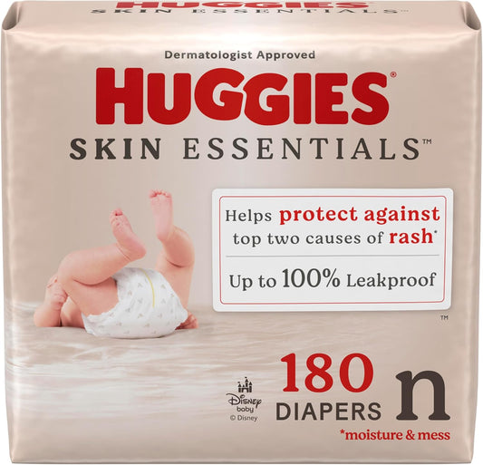 Huggies Size Newborn Diapers, Skin Essentials Baby Diapers, Size Newborn (6-9 lbs), 180 Count (3 Packs of 60), Packaging May Vary